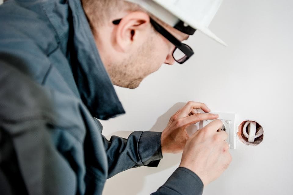 Electrician working on wiring
